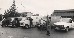 Employees of the Furnace Man standing in front of their service vans in 1980.